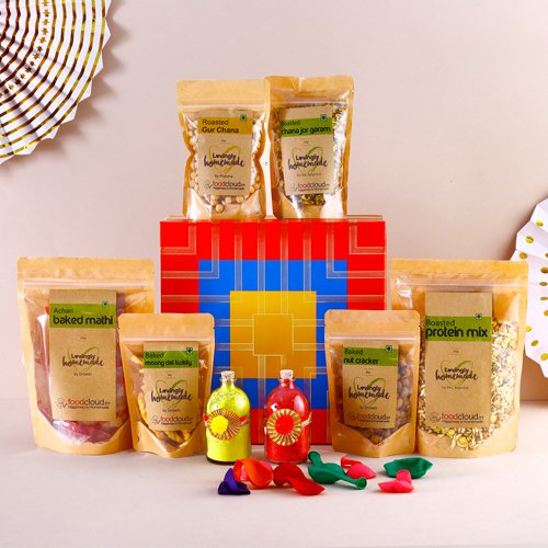Attractive Holi Hamper of Assorted Treats with Organic Gulal