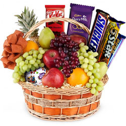 Tasty Assorted Chocolates Gift Hamper with Mixed Fruits