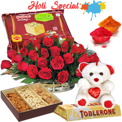 Nicely Gift Wrapped 50 Red Roses Basket Mixed Dry fruits 500 gms. Haldiram's Soan Papdi 500 gms. a small Teddy Bear and Toblerone bar 4 Pcs with free Gulal/Abir Pouch.