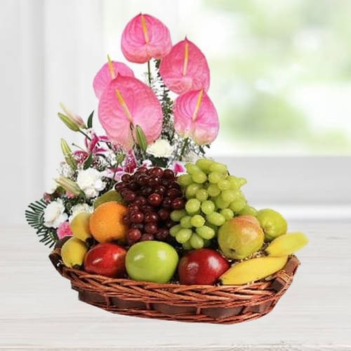 Classically-Styled Fruits Basket decorated with Anthodium, Lily n Carnations