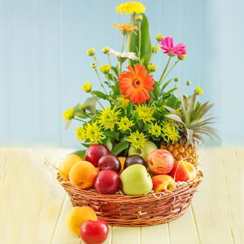 Plentiful Fresh Fruits with Gerberas Gift Basket