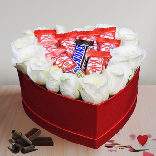 Breathtaking Display of White Roses N Chocolate in Heart Box