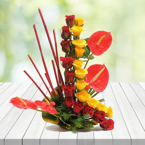 Exquisite Arrangement of Red N Yellow Roses with Anthurium