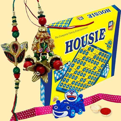 Incomparable Housie Deluxe Family Board Game with Rakhi Lumba Doraemon Rakhi and Roli Tilak and Chawal.